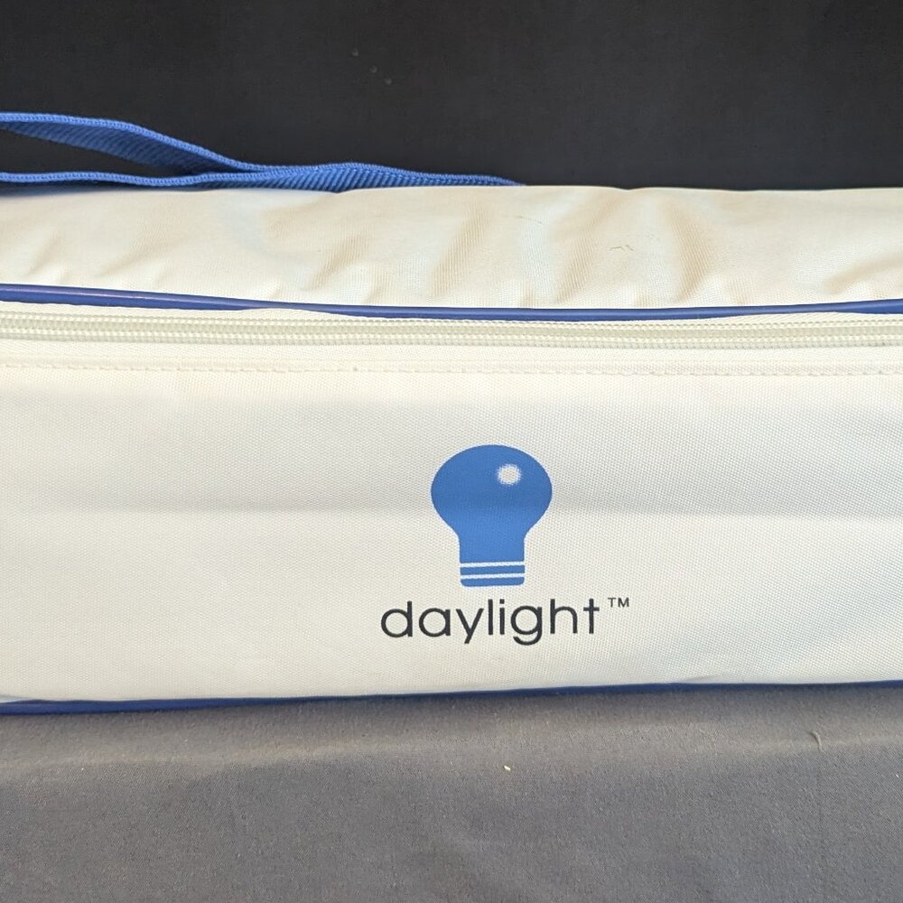 The Working Natural Daylight Foldable Lamp in Case by Daylight is a versatile an